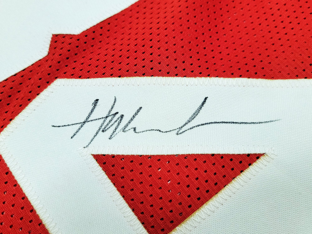 Houston Rockets Hakeem Olajuwon Autographed Red Jersey The Dream JSA Image a