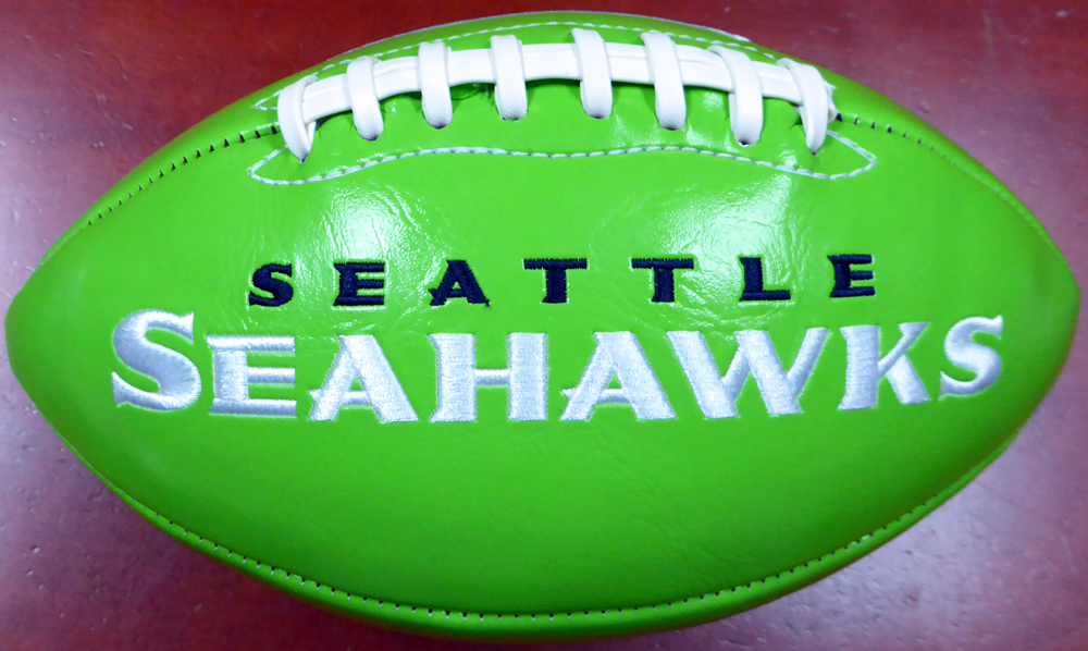 Russell Wilson Autographed Green Logo Football Seattle Seahawks Rw Holo #113614 Image a