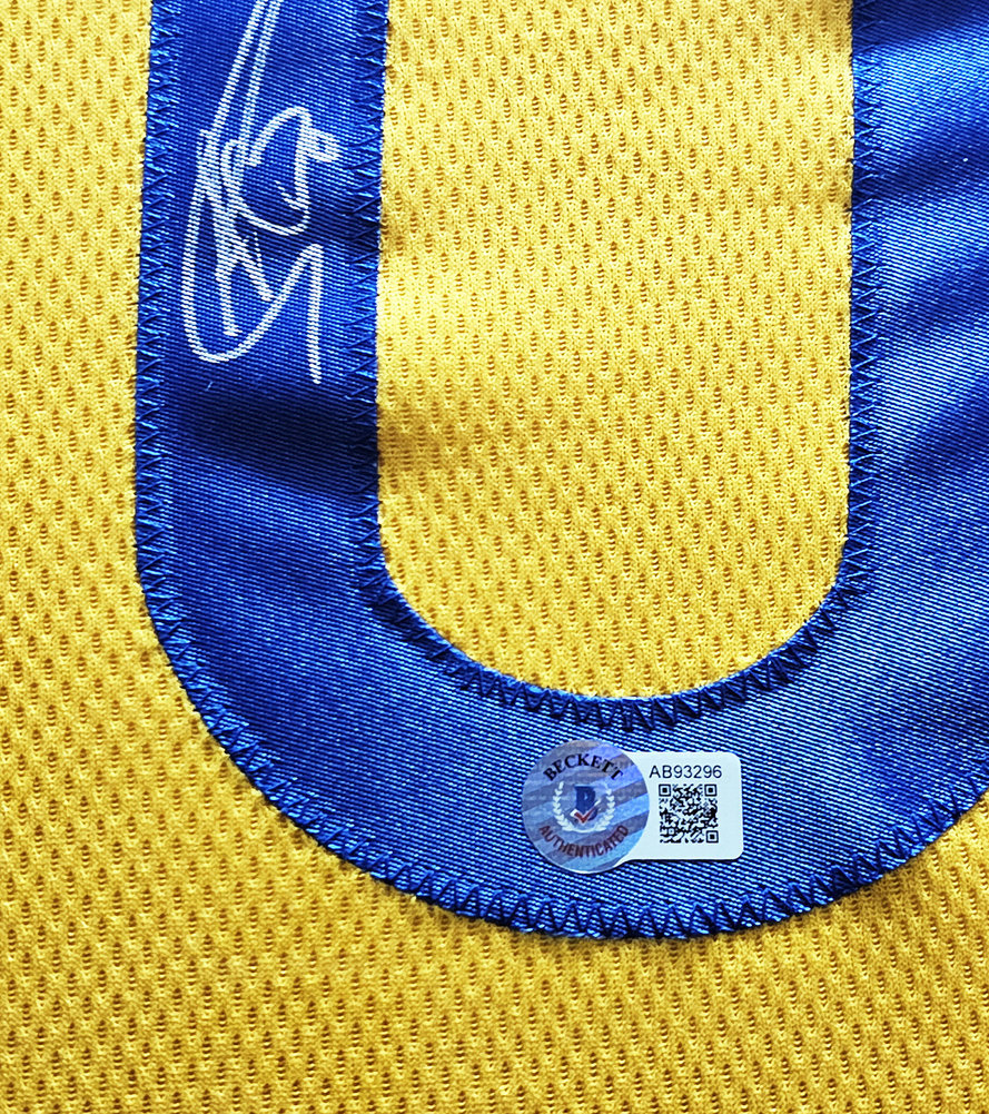 Golden State Warriors Stephen Curry Autographed Framed Yellow Jersey Beckett Beckett Image a