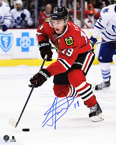 Jonathan Toews Autographed / Signed Chicago Blackhawks With Puck Action 8x10 Photograph - Authentic Signature