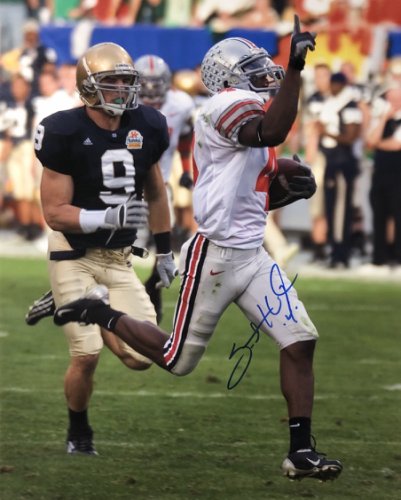 Autographed Santonio Holmes Picture - 16x20 black jersey) - Hologram