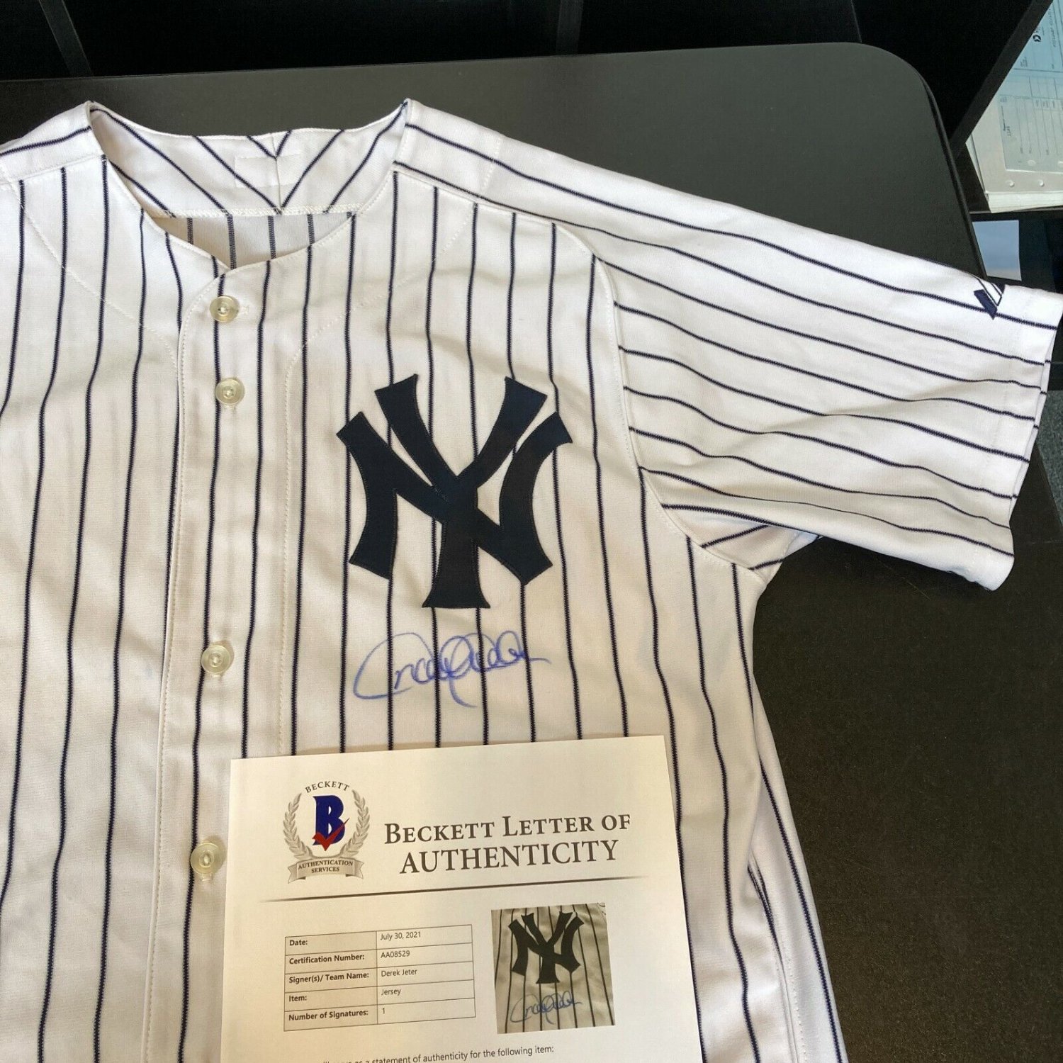 Derek Jeter Autographed and Framed New York Yankees Jersey