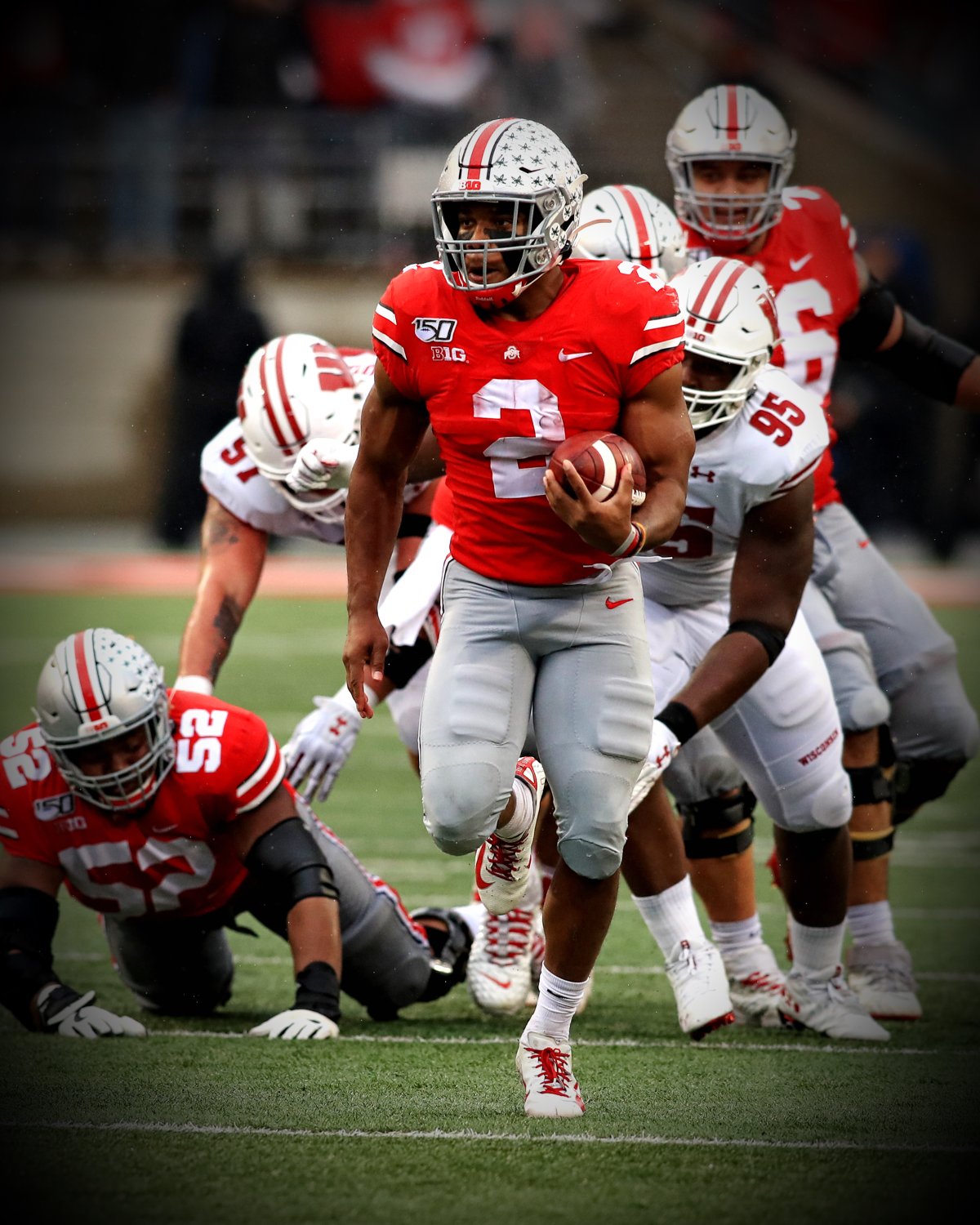 JK Dobbins Ohio State Buckeyes Licensed Unsigned Photo 50