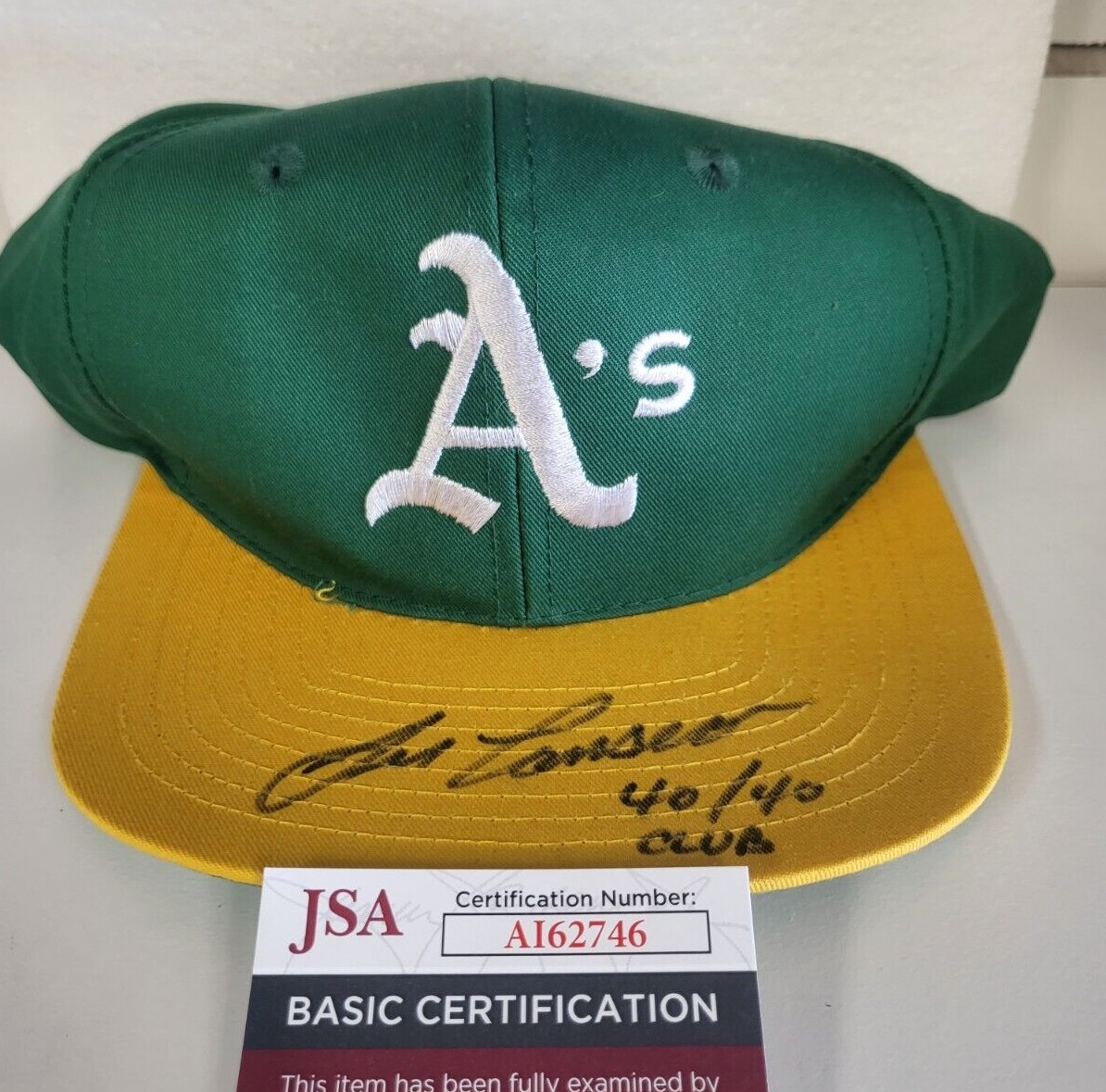 Autographed/Signed Jose Canseco Oakland Yellow Baseball Jersey JSA
