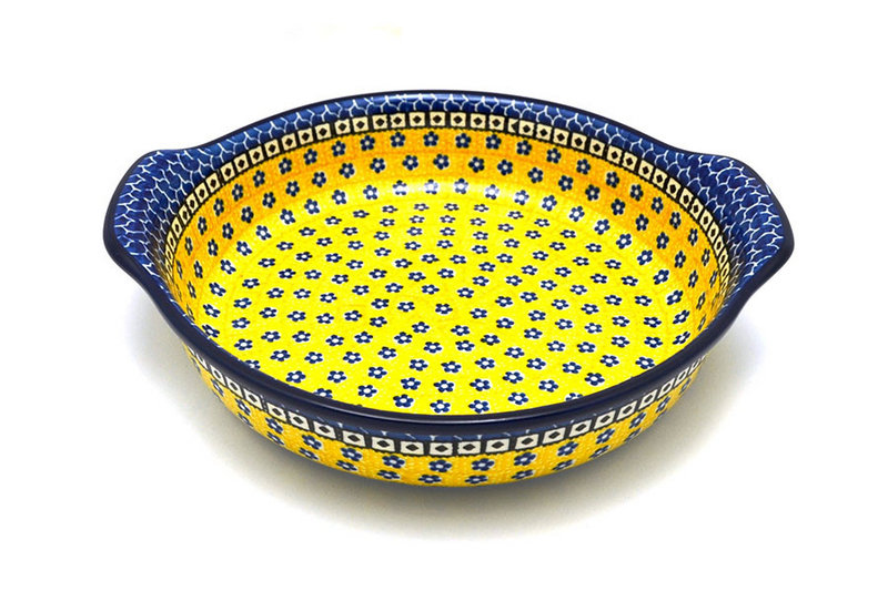 2 1/4"H x 10 1/4"W x 11 1/4"L (at handles)
 Polish Pottery Baker - Round with Grips - Large - Sunburst 417-859a (2 1/4"H x 10 1/4"W x 11 1/4"L (at handles)
)