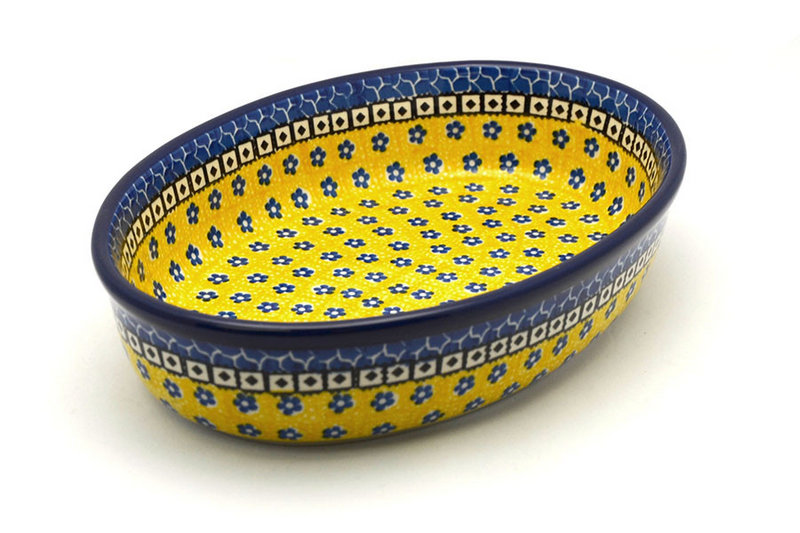 2 1/4"H x 7 1/2"W x 10 3/4"L.
 Polish Pottery Baker - Oval - Medium - Sunburst 298-859a (2 1/4"H x 7 1/2"W x 10 3/4"L.
)
