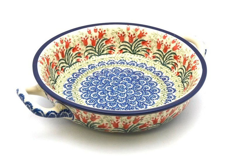 2"H x 8"W x 10"L (at handles)
 Polish Pottery Baker - Round with Handles - 8" - Crimson Bells 419-1437a (2"H x 8"W x 10"L (at handles)
)