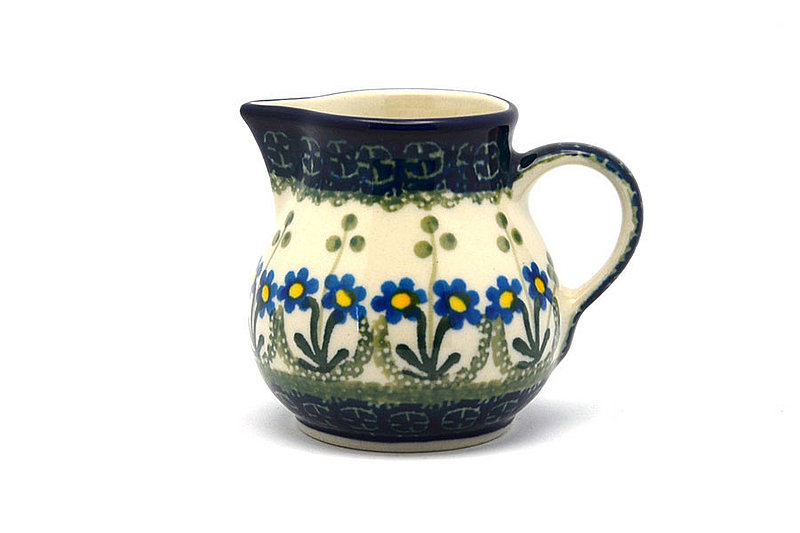 3"H x 2 3/4"W x 3 5/8"L. 
 Polish Pottery Creamer - 4 oz. - Blue Spring Daisy 091-614a (3"H x 2 3/4"W x 3 5/8"L.  
)