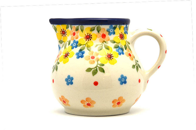 3"H x 2 3/4"W x 3 5/8"L. 
 Polish Pottery Creamer - 4 oz. - Buttercup 091-2225a (3"H x 2 3/4"W x 3 5/8"L.  
)