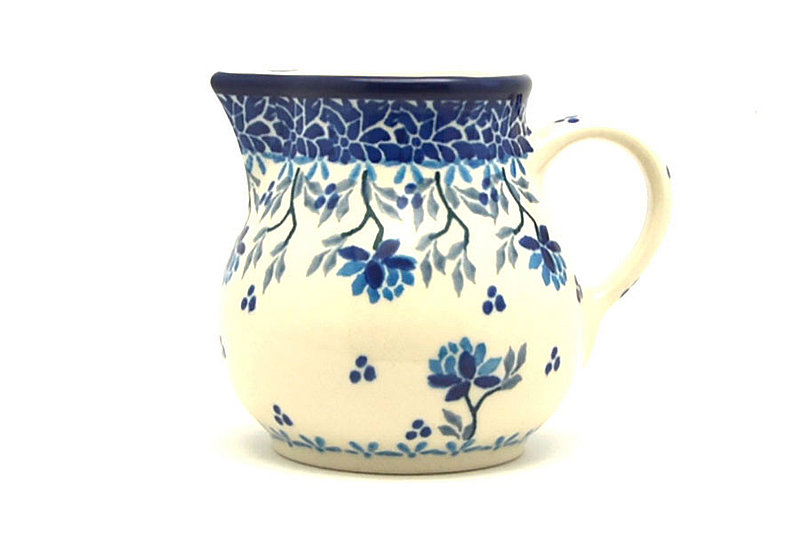 3"H x 2 3/4"W x 3 5/8"L. 
 Polish Pottery Creamer - 4 oz. - Clover Field 091-2524a (3"H x 2 3/4"W x 3 5/8"L.  
)