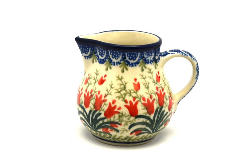 3"H x 2 3/4"W x 3 5/8"L. 
 Polish Pottery Creamer - 4 oz. - Crimson Bells 091-1437a (3"H x 2 3/4"W x 3 5/8"L.  
)