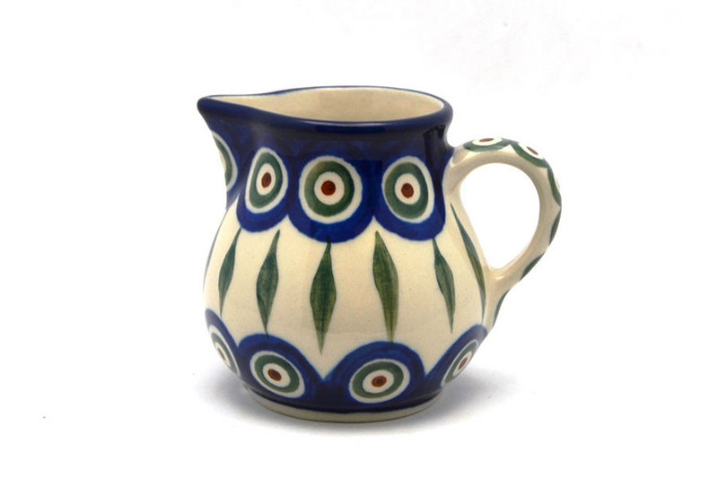 3"H x 2 3/4"W x 3 5/8"L. 
 Polish Pottery Creamer - 4 oz. - Peacock 091-054a (3"H x 2 3/4"W x 3 5/8"L.  
)