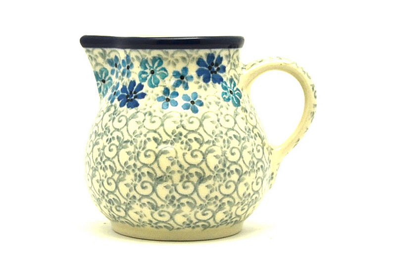 3"H x 2 3/4"W x 3 5/8"L. 
 Polish Pottery Creamer - 4 oz. - Sea Blossom 091-2612a (3"H x 2 3/4"W x 3 5/8"L.  
)