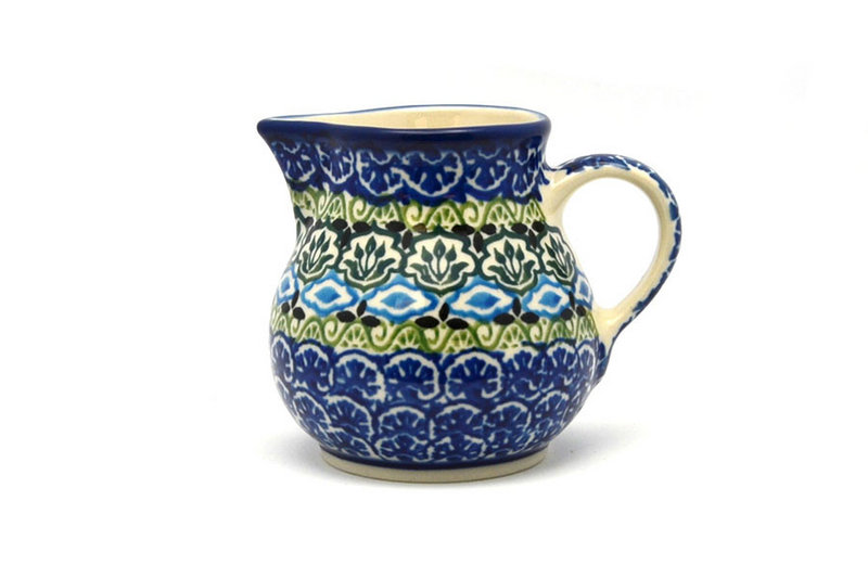 3"H x 2 3/4"W x 3 5/8"L. 
 Polish Pottery Creamer - 4 oz. - Tranquility 091-1858a (3"H x 2 3/4"W x 3 5/8"L.  
)