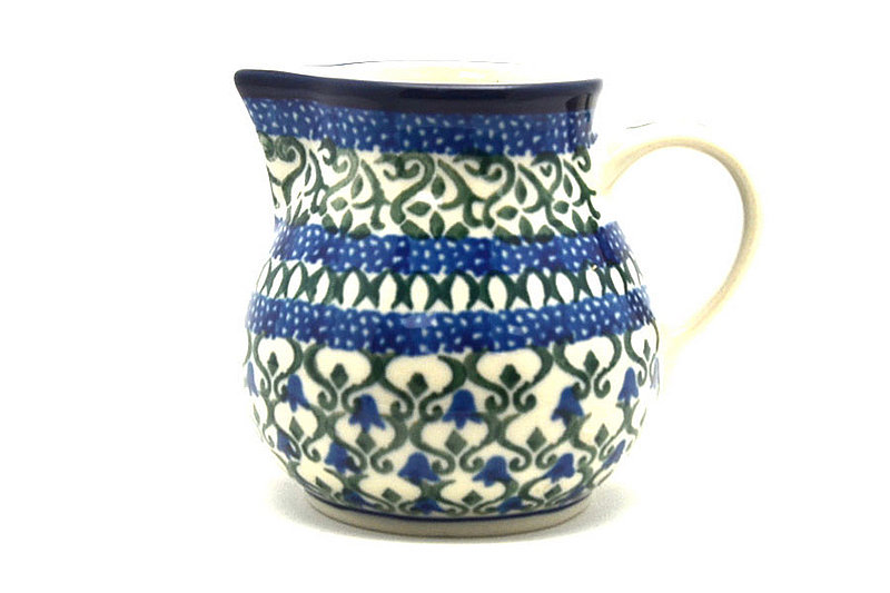 3"H x 2 3/4"W x 3 5/8"L. 
 Polish Pottery Creamer - 4 oz. - Tulip Trellis 091-0585a (3"H x 2 3/4"W x 3 5/8"L.  
)