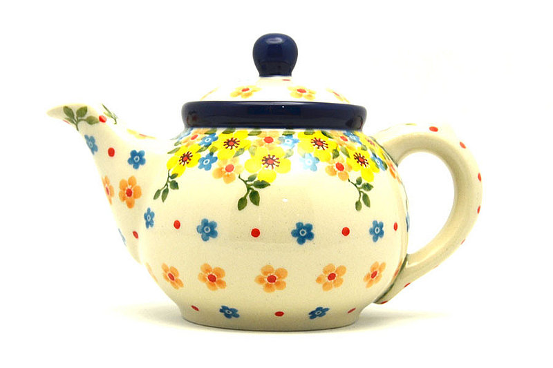 4 1/4"H x 4"W x 6 3/4"L, 14 oz. (filled to the rim)
 Polish Pottery Teapot - 14 oz. - Buttercup 120-2225a (4 1/4"H x 4"W x 6 3/4"L, 14 oz. (filled to the rim)
)
