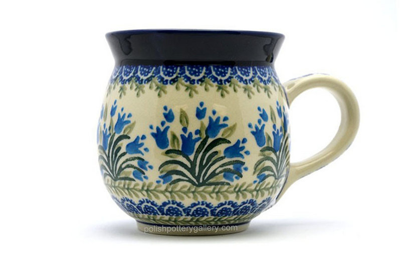 4"H (15 oz measured near the rim)
 Polish Pottery Mug - 15 oz. Bubble - Blue Bells 073-1432a (4"H (15 oz measured near the rim)
)