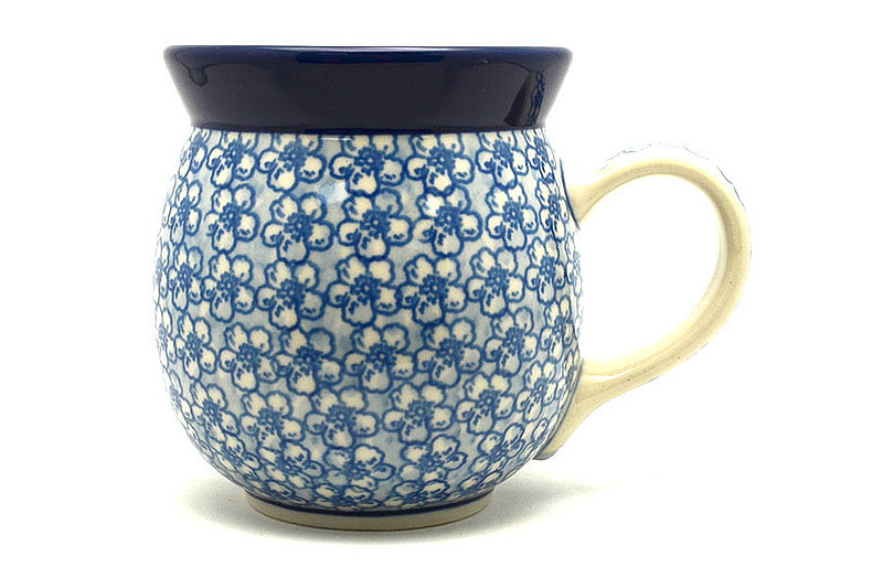 4"H (15 oz measured near the rim)
 Polish Pottery Mug - 15 oz. Bubble - Daisy Flurry 073-2176a (4"H (15 oz measured near the rim)
)