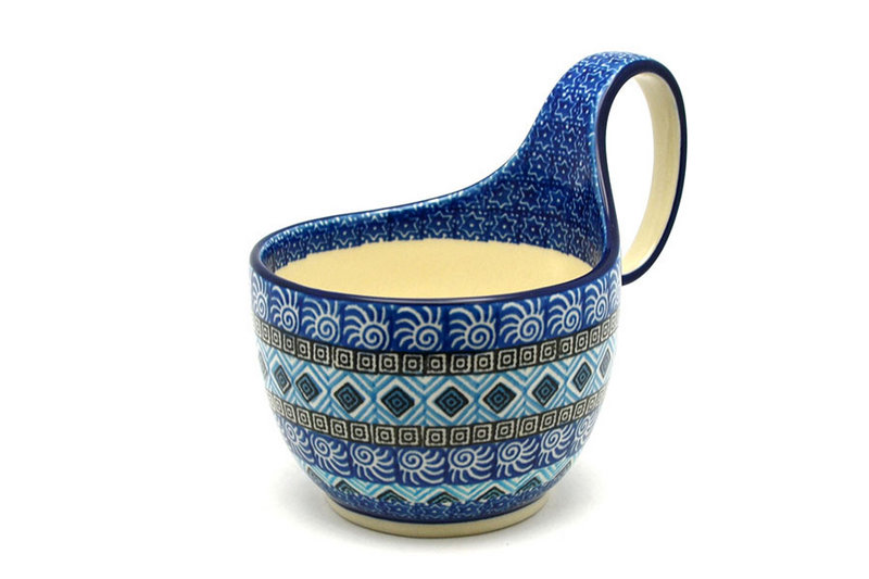 5" H. (bowl portion is 3 1/4"H x 4 3/8"W)
 Polish Pottery Loop Handle Bowl - Aztec Sky 845-1917a (5" H. (bowl portion is 3 1/4"H x 4 3/8"W)
)
