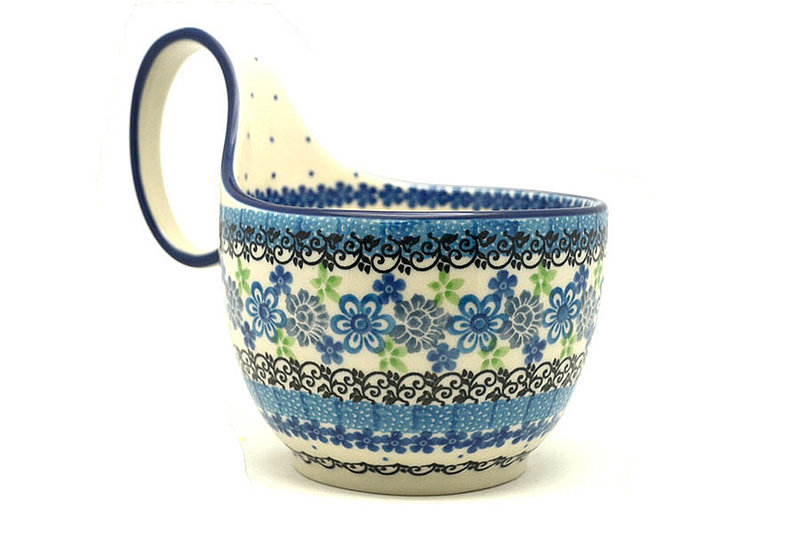 5"H (bowl portion is 3 1/4"H x 4 3/8"W).
 Polish Pottery Loop Handle Bowl - Flower Works 845-2633a (5"H (bowl portion is 3 1/4"H x 4 3/8"W).
)