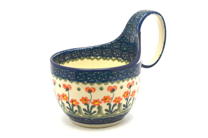 5"H (bowl portion is 3 1/4"H x 4 3/8"W).
 Polish Pottery Loop Handle Bowl - Peach Spring Daisy 845-560a (5"H (bowl portion is 3 1/4"H x 4 3/8"W).
)