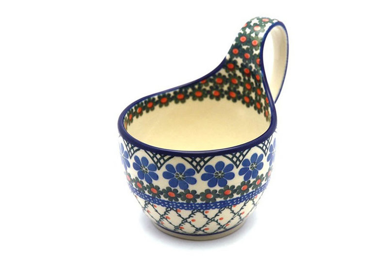 5"H (bowl portion is 3 1/4"H x 4 3/8"W).
 Polish Pottery Loop Handle Bowl - Primrose 845-854a (5"H (bowl portion is 3 1/4"H x 4 3/8"W).
)